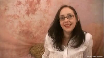 Cute brunette in glasses sucking a hard dick