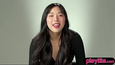 Slender sexy Asian beauty strips to show off perky small tits and masturbates