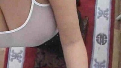 Demi Dean wanks cock on her big tits